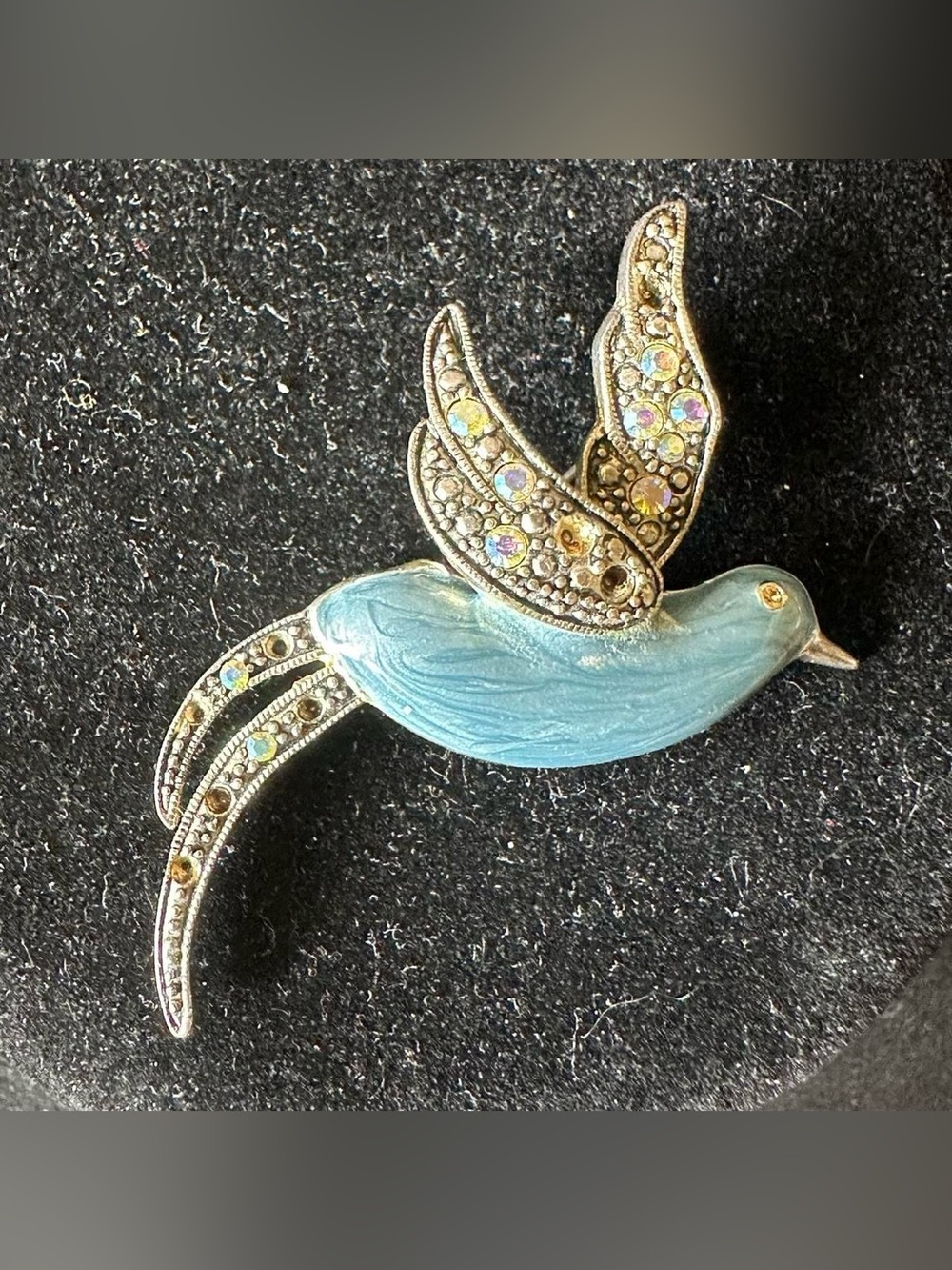 Vintage blue bird rhinestone pin.